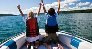 two people on boat with lifejackets