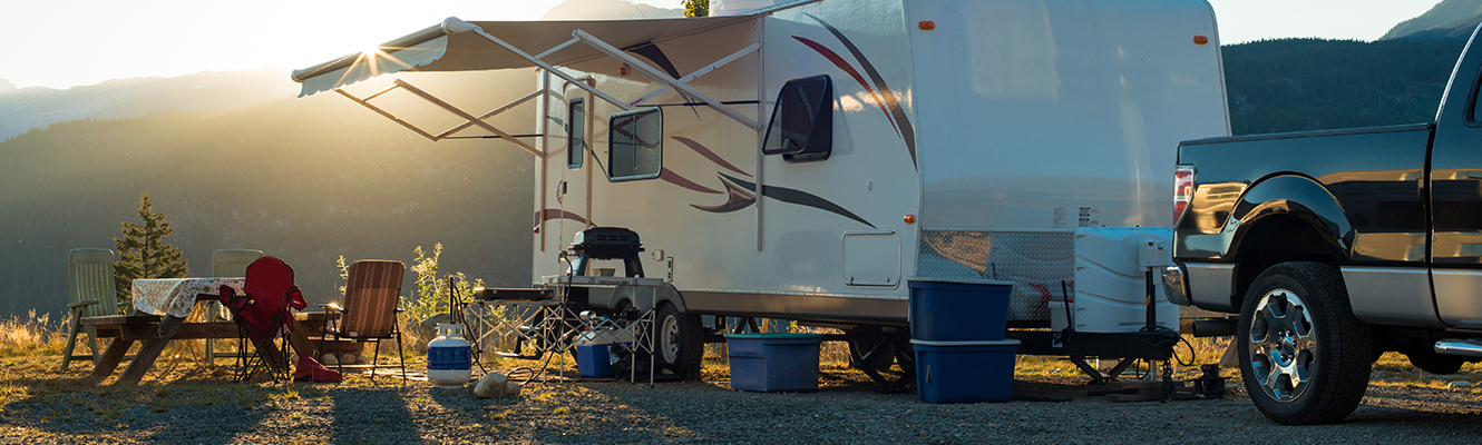 Truck with RV behind it