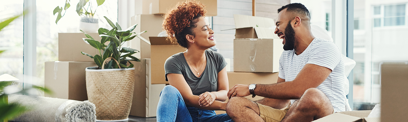 Couple with moving boxes