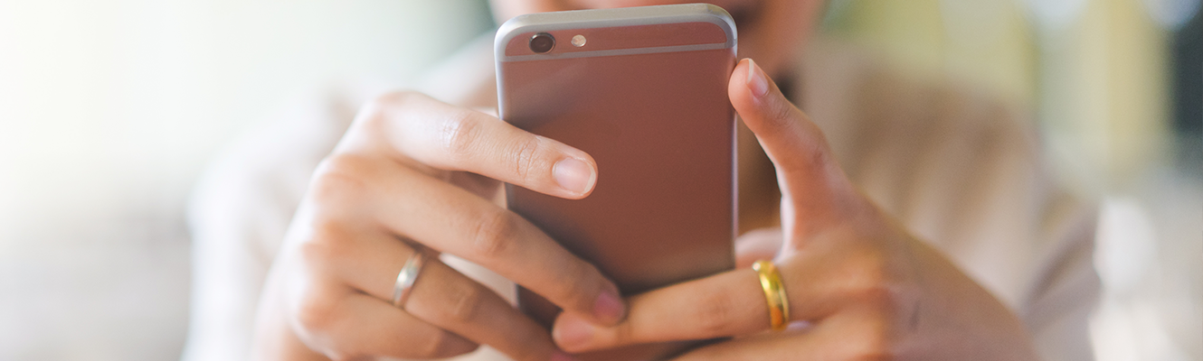 woman holding mobile phone