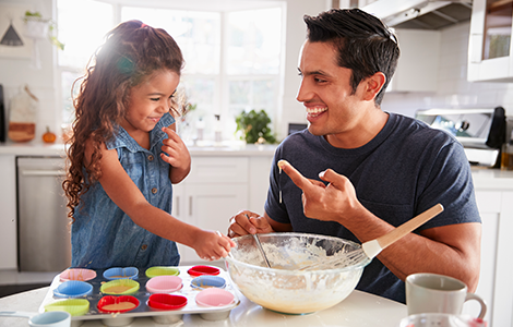 dad and daughter baking