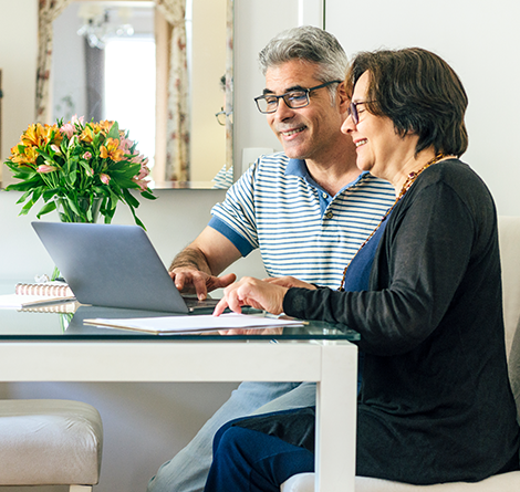 tow adults on computer