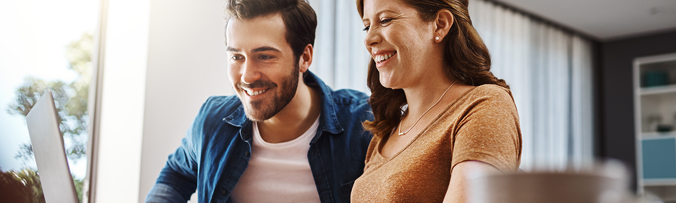 couple looking at laptop