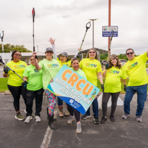 Community Resource Credit Union employees taking a group photo in Baytown.
