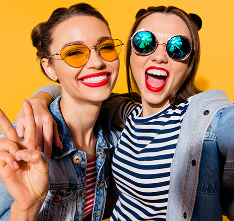 friends wearing colorful sunglasses