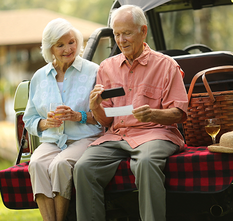 Old Couple using mobile deposit