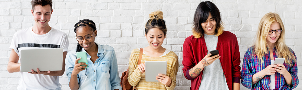 A group of diverse people on their online devices