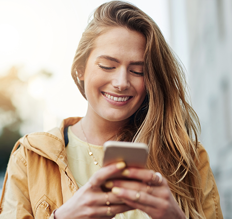 A woman texting on her mobile phone