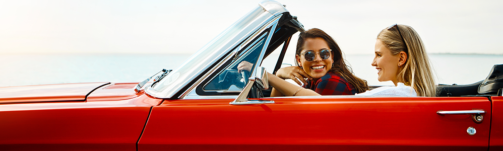 friend driving in red car