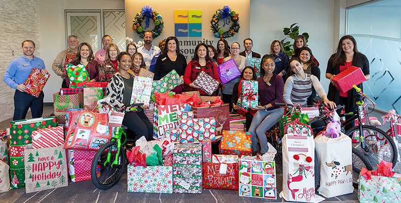CRCU Team with Christmas Donations for Lamar Elementary