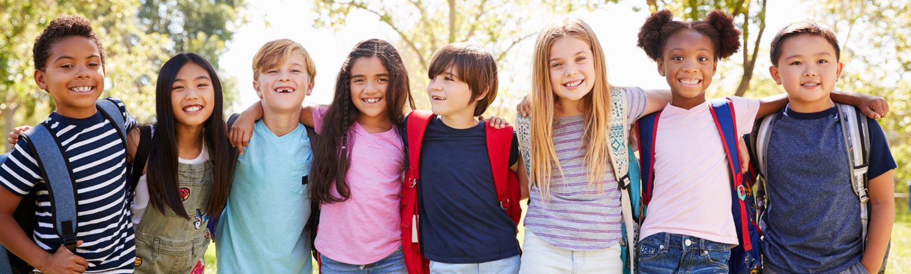 group of kids with arms around each other